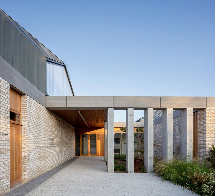 The route out of the chapel is punctuated by a landscaped courtyard to the left of mourners as they leave.