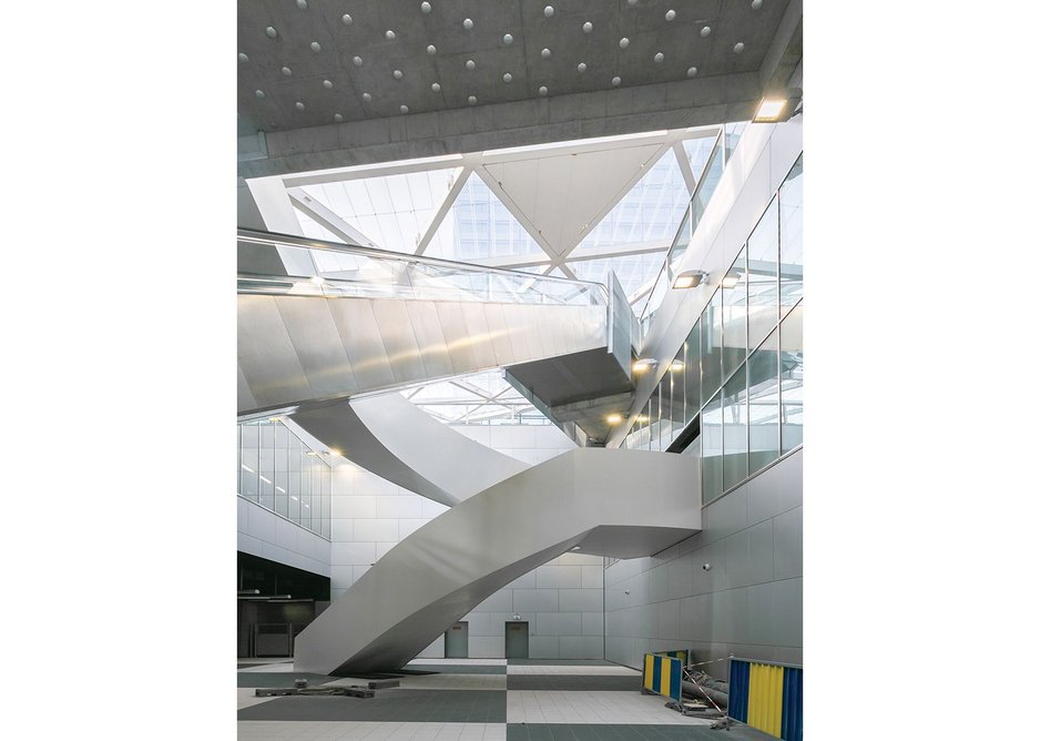 The dramatic void conecting the station concourse level with Rogier Square above.