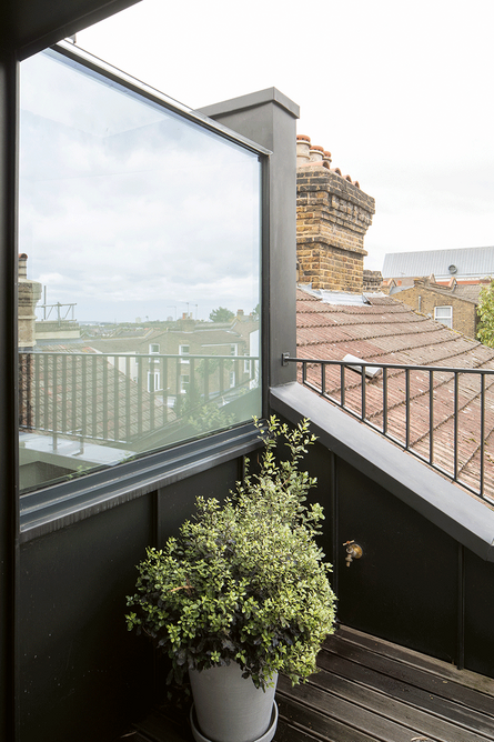An upper terrace gives vertiginous views down into the staircase.