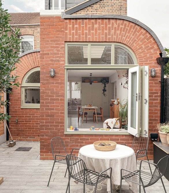 Rear windows fold back to open up the extension to the garden.