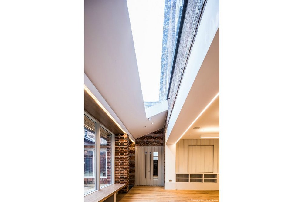 Glazing Vision's Flushglaze rooflight creates a cloistered feel along a run of corridor.