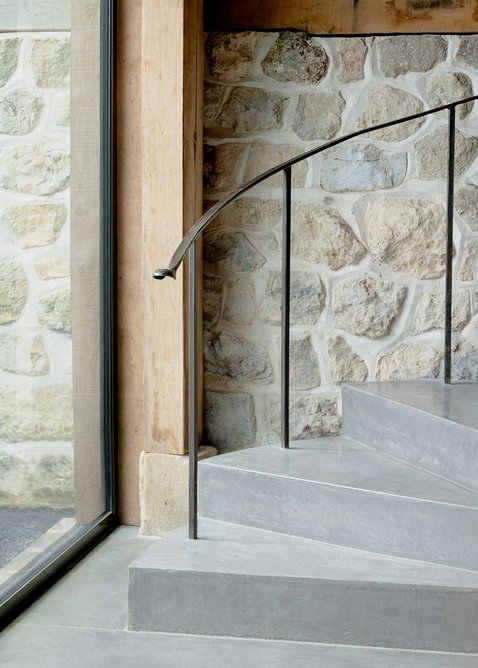 Four bespoke iron handrails were made for the project by a local blacksmith.