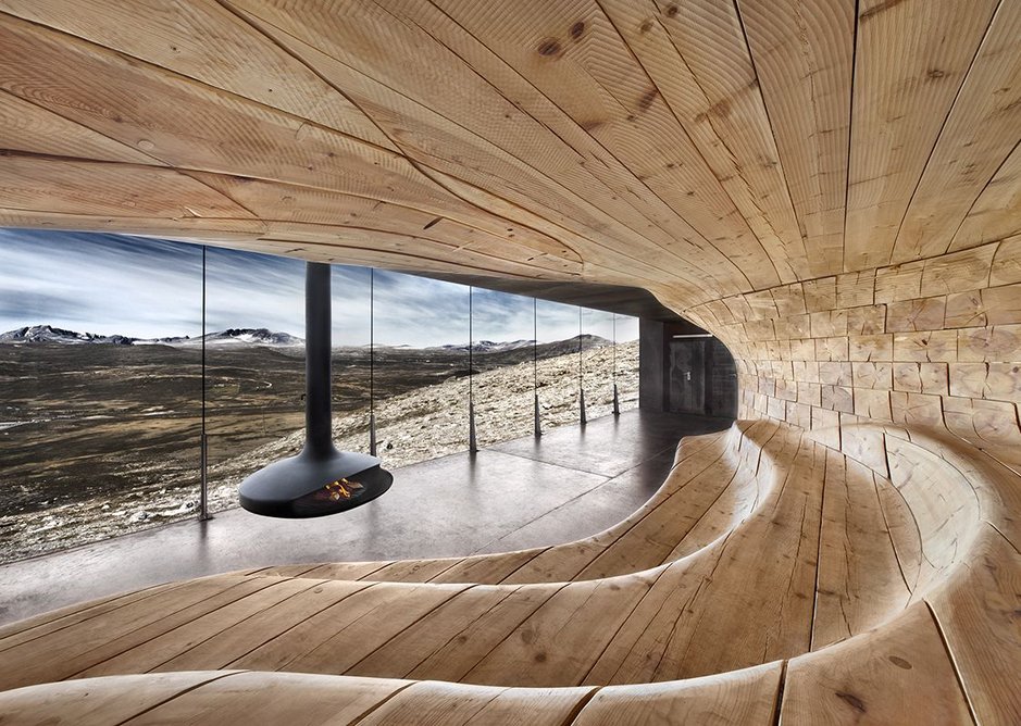 A Gyrofocus fireplace at Snøhetta architects' Norwegian Wild Reindeer Centre Pavilion in Hjerkinn.