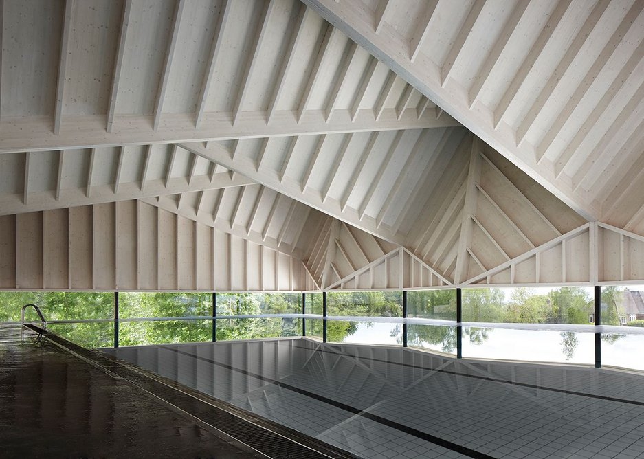 The roof appears to float above the pool.