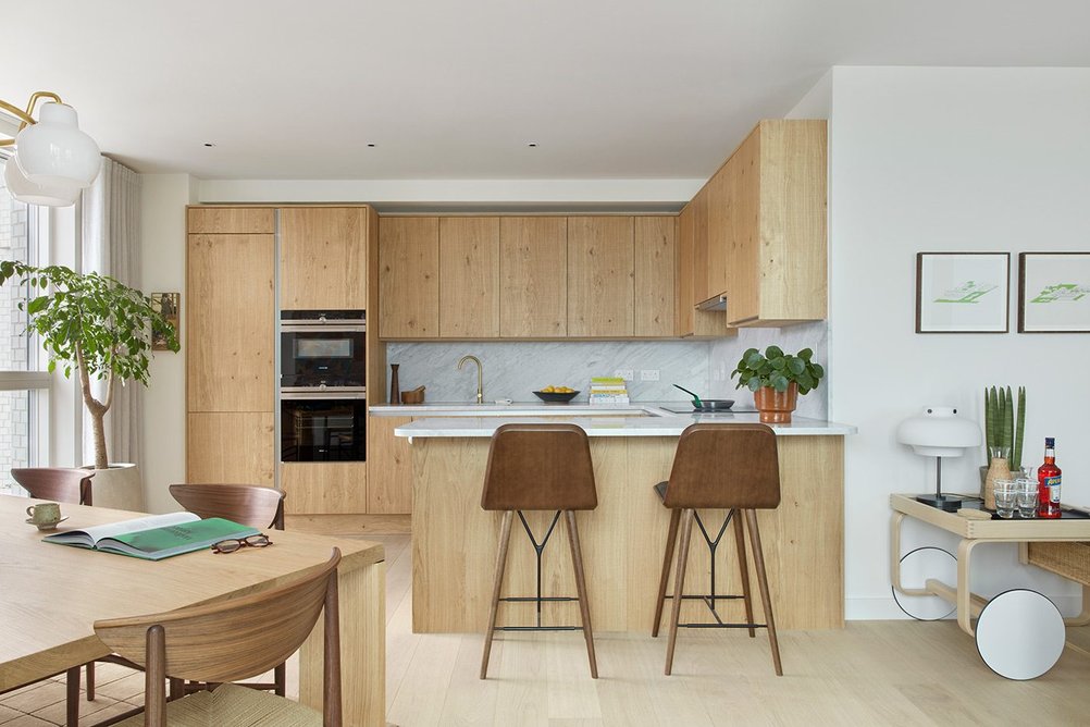 The timber-effect kitchen in one of the penthouse apartments.