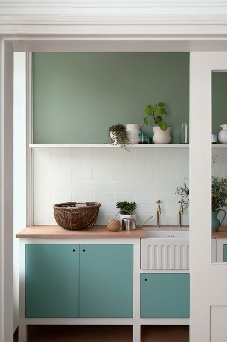 Wall painted in Salvia, Architects' Matt; units, Deep Water Green; tiles, Glass I; shelf, Canvas I; door, Clean White, all Architects’ Satinwood, Paint & Paper Library.