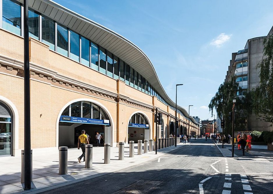 The roof touches the existing structure lightly so as not to overwhelm it.