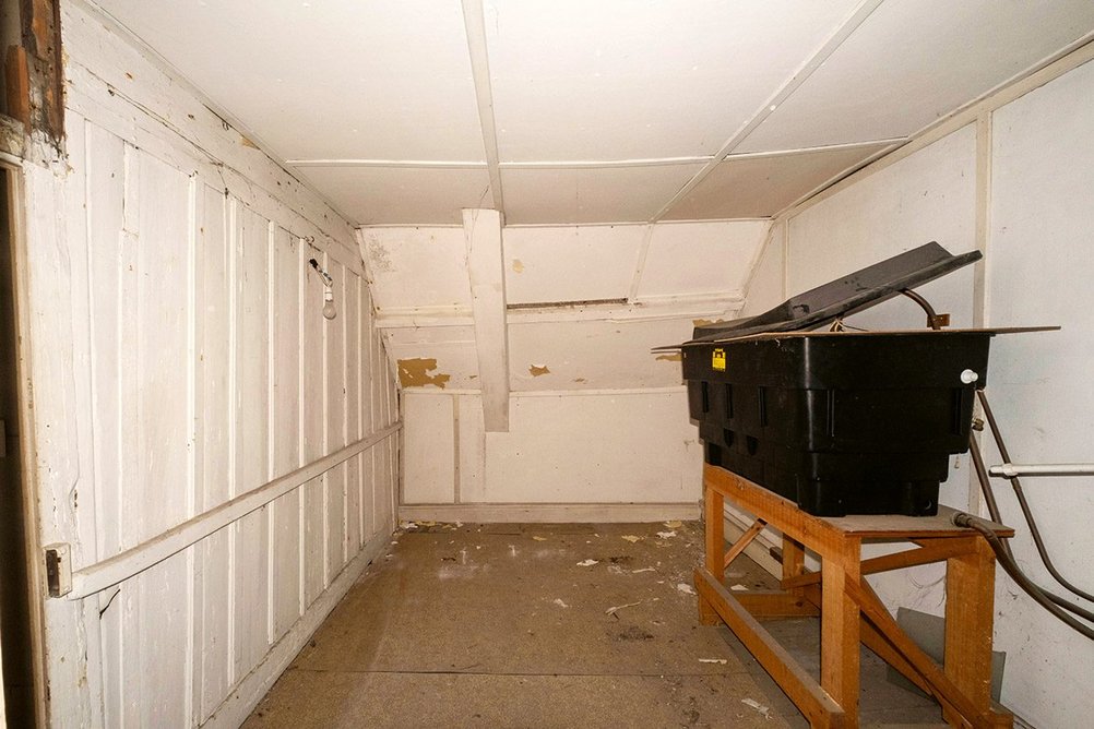 The existing attic space was lightless and in poor condition.