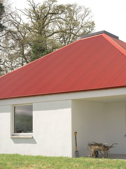 The clients needed a home which attended to their distinct occupations; farming and the arts.