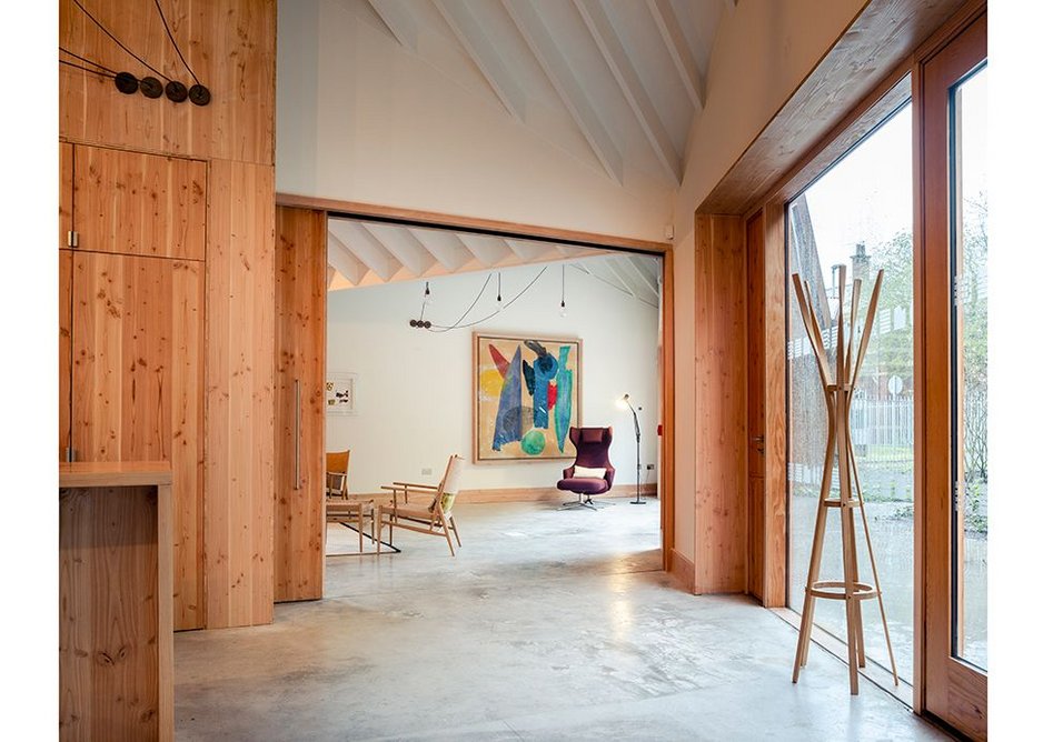 A sliding door means the studio space can be opened up to add to the main space or closed for yoga or art activities.