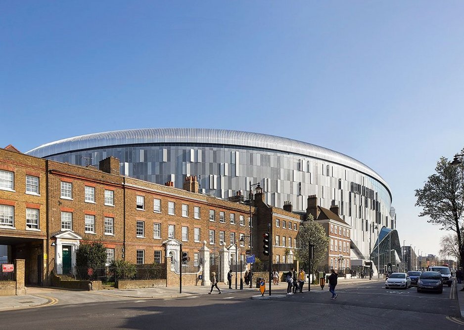 The new stadium has to squeeze its massive form behind some far smaller period neighbours.