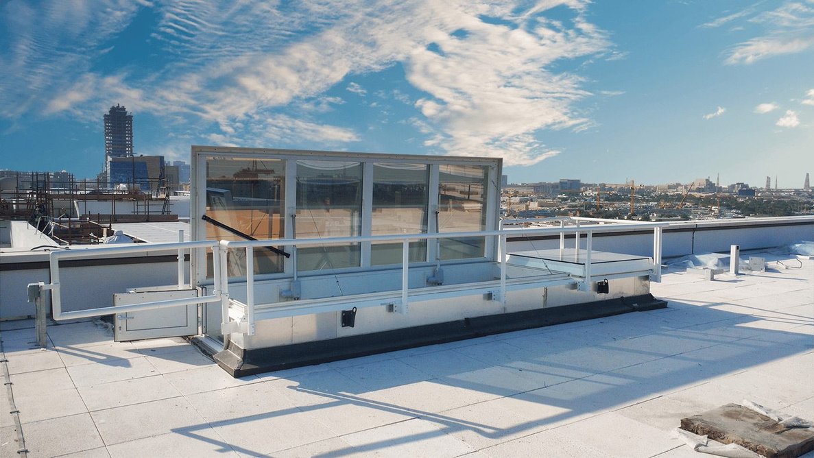 Glazed Surespan roof access skylight on a terrace.