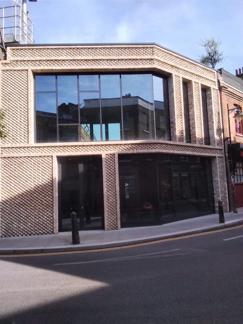 Building 3: From street to roof level, brick interventions reference the site's historic architecture.