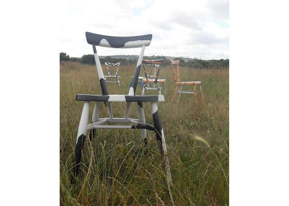 Reworked chairs, in a field.