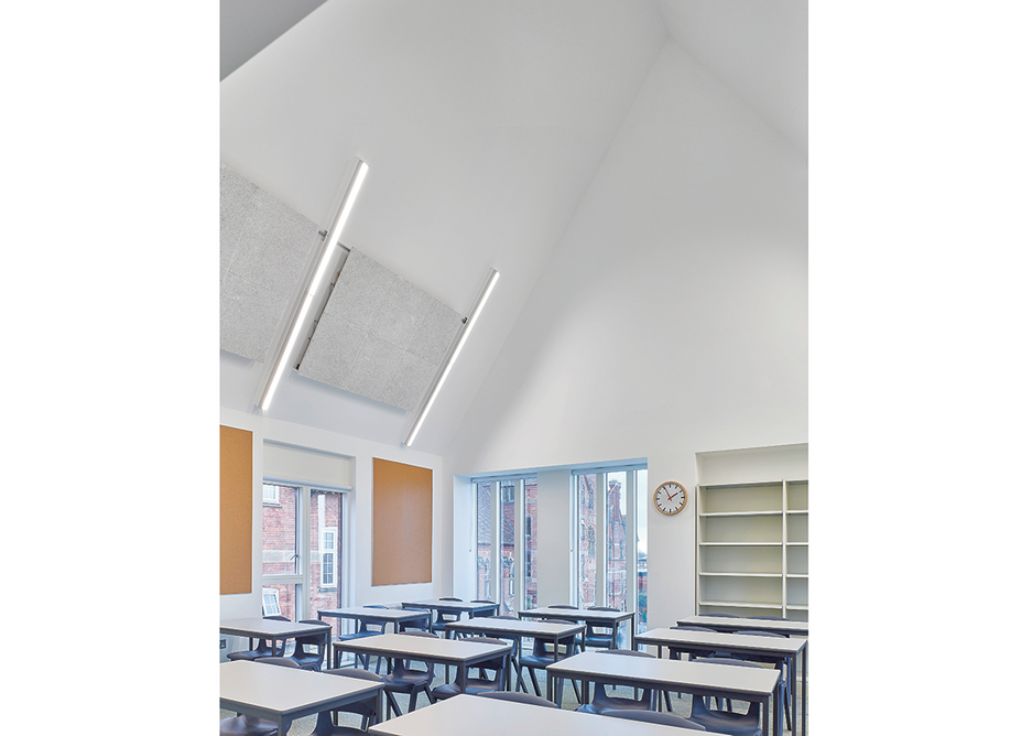 English department classrooms on the first floor borrow extra daylight via a corridor.