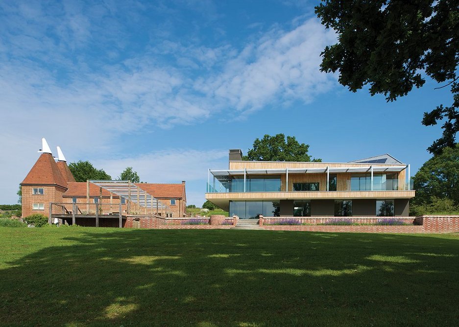 New House, south elevation. The home is part of the wider modernisation of the whole farm site: oast house, pool house and energy centre.