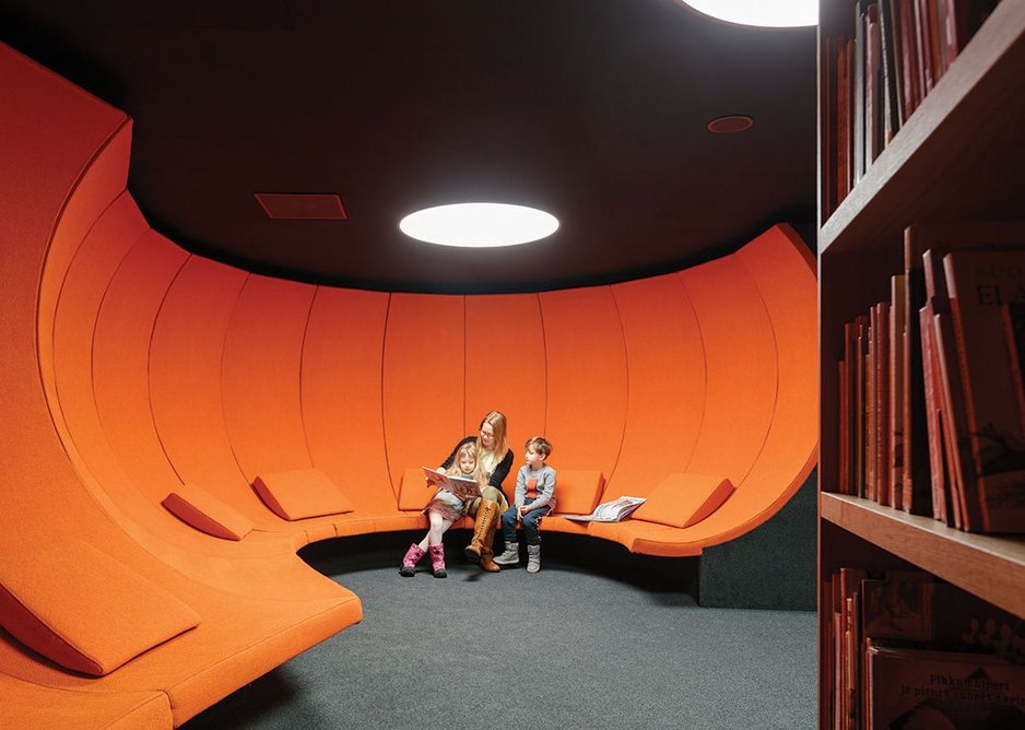 Children’s storytelling spaces are hidden behind a secret door in the bookshelf.