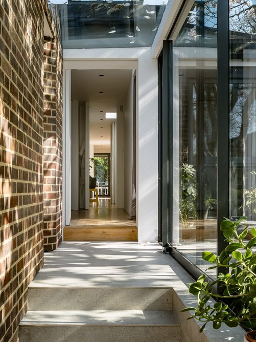 The glass link between the main house and new extension was designed to look like an external courtyard.
