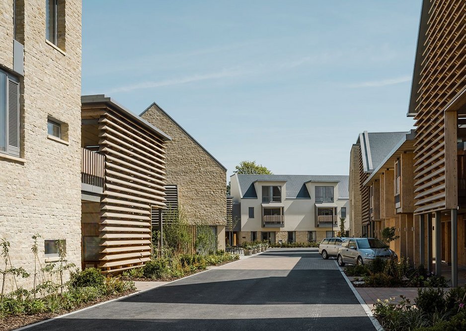 Timber louvres mark out entrances to groups of flats.