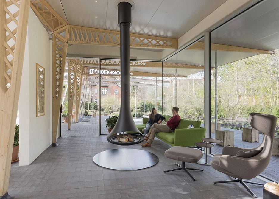 Foster + Partners’ Maggie’s Centre in Manchester avoids institutional references and instead has a warm material palette including timber lattice beams.