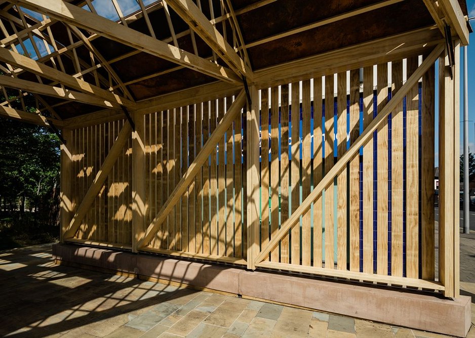 Rear of the pavilion screens shop behind - note clay-concrete ground beam.