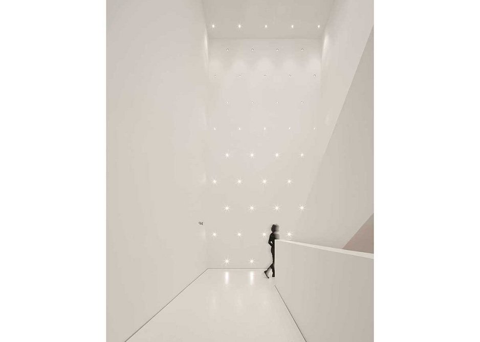 The main stair of the extension going down through the gallery levels provides the opportunity for a radical contrast with the 17th century main building.