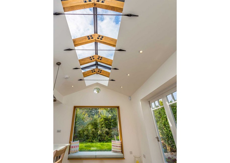 Picture windows and skylights bring the outdoors in.