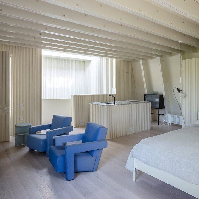 Toplight plays on the ribbed walls to aid navigation and create pockets of interest.