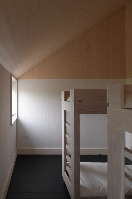 Maich Swift Architects had a very complete idea of the house design vision and so got involved in the fine details too, designing the beds throughout including children's bunk beds.