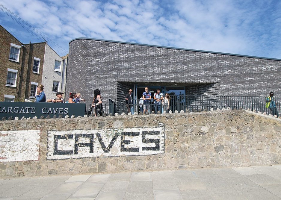 Architecturally the visitor centre had to fit into a mixed spot with rendered social housing on one side and a listed flint building on the other.