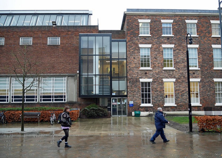 The school's late Georgian buildings (right) meet the 1933 Leverhulme Building by CH Reilly as extended in 1989 by King McAllister