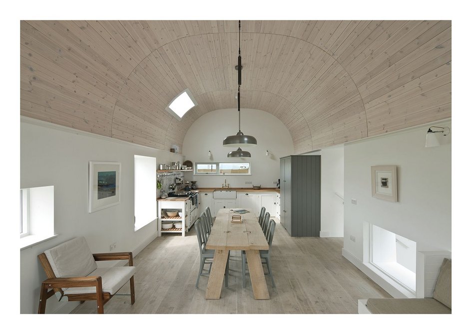 The living house has a tunnel-shaped ceiling.