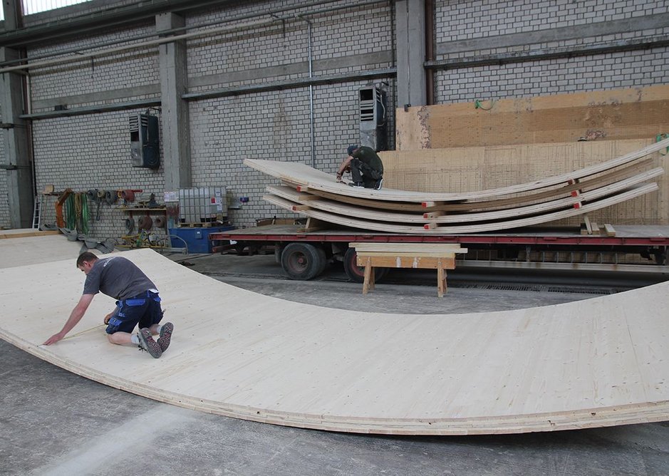 At the Merk factory as timber panels are fabricated and bent into shape.