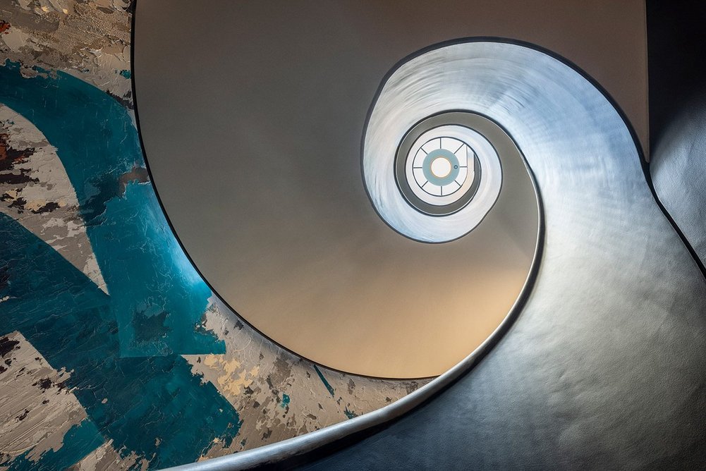 Oneness, a mural created by Shahrzad Ghaffari in the new helical staircase designed by BDP. ©RBKC. Image courtesy of Dirk Lindner