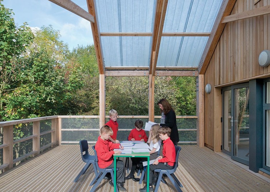 The classroom extends into the landscape for al fresco learning.