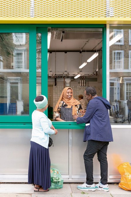 A sliding window to the kitchen makes a serving hatch to the street.