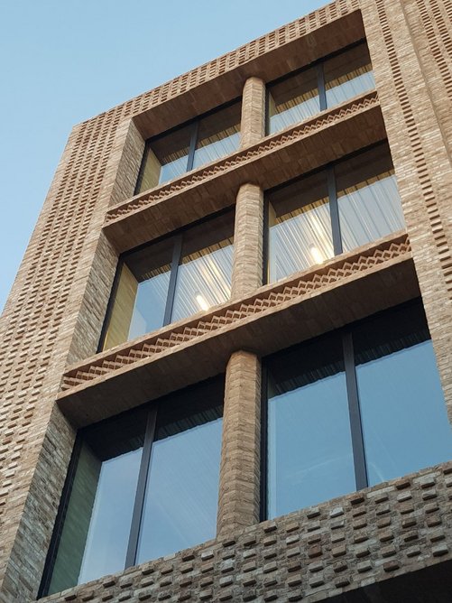 Mechanically fixed BOSS+: A lightweight brick slip soffit system with mechanically fixed brick slips.