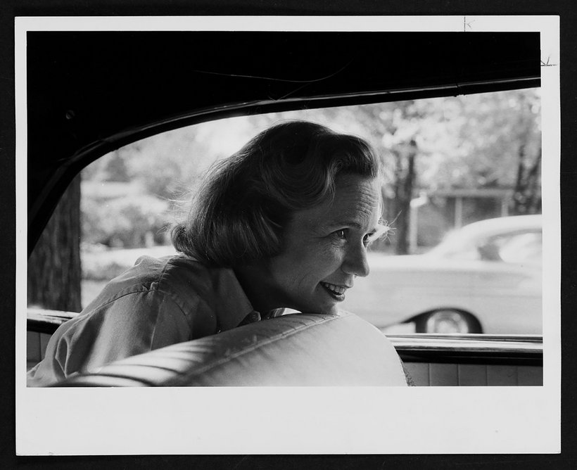 Aline B Louchheim in the back of a car.