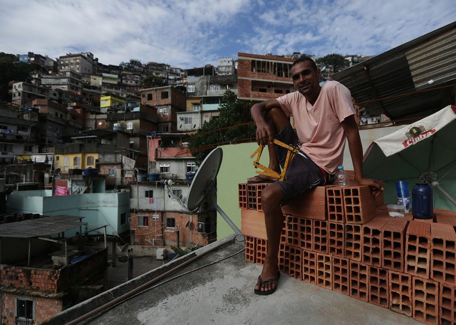 Self-trained favela architect Ricardo de Oliveiro plans to extend his house in Brazil into a five-floor building.