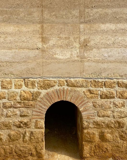 The opening of the furnace in the base of the villa.