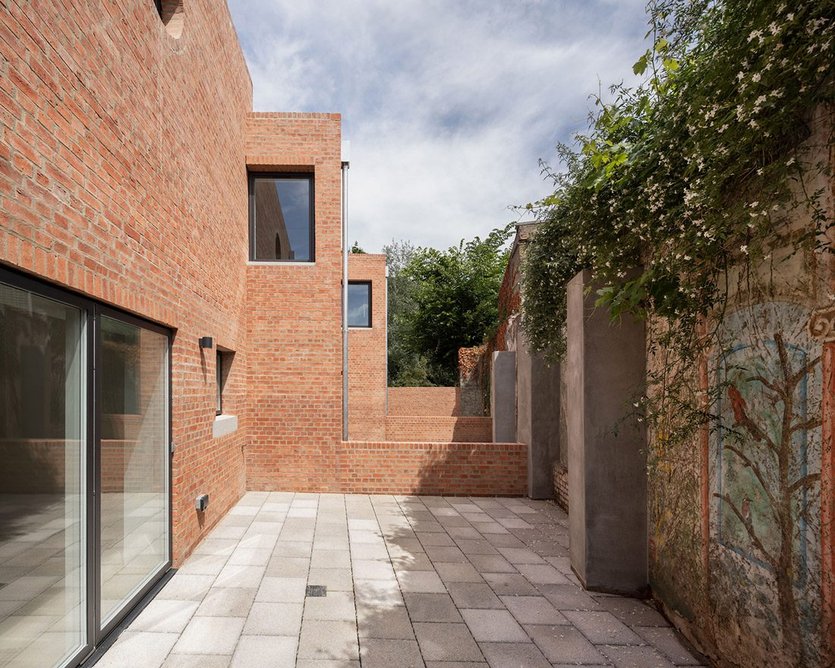 Each house has a private patio garden to the rear.