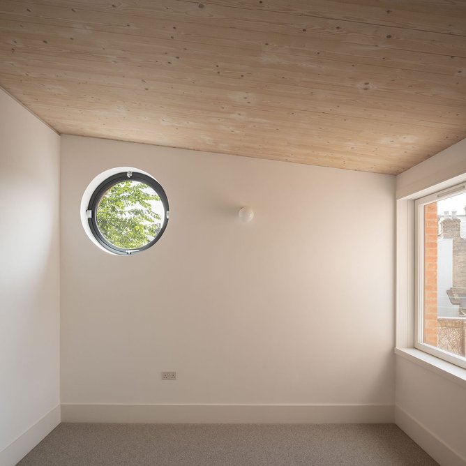 To minimise overlooking, a window in the back bedroom was swapped for a porthole.