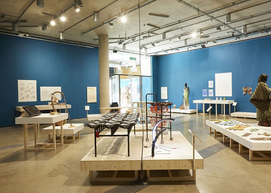 Installation shot of Designing in Turbulent Times, showing Qiang Huang’s Bike Scavengers furniture in the foreground.