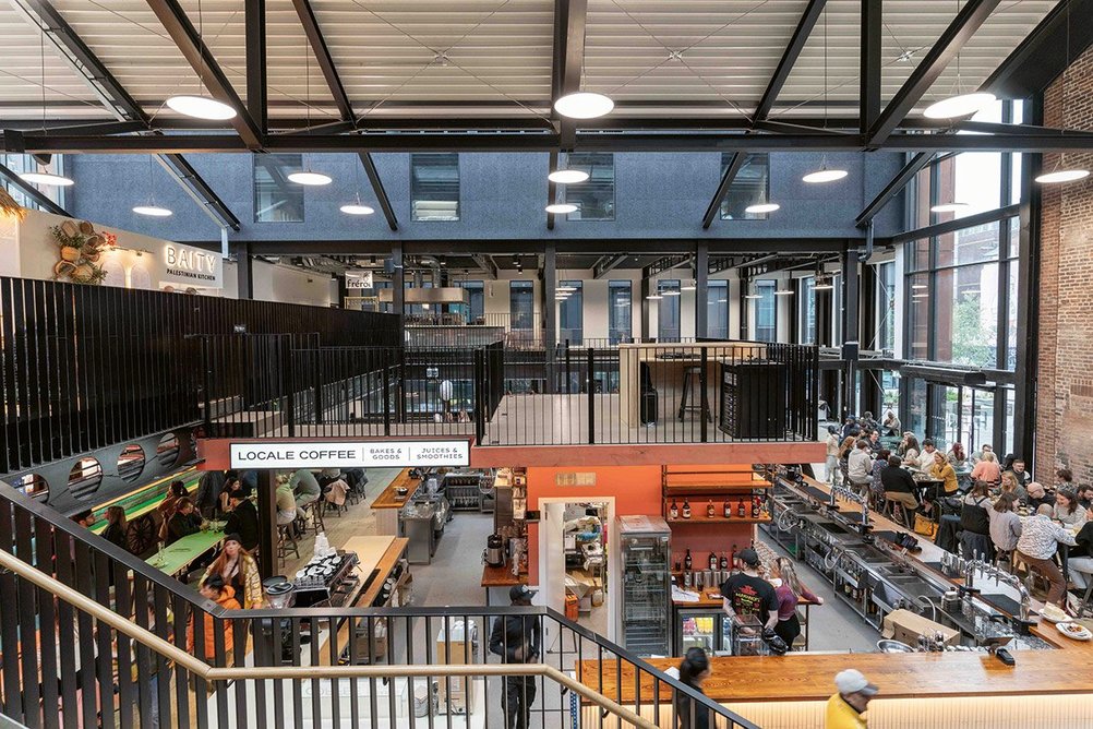 Inside the Cambridge Street Collective food hall, where FCBS has created a vast multi-storey space beneath a new roof.