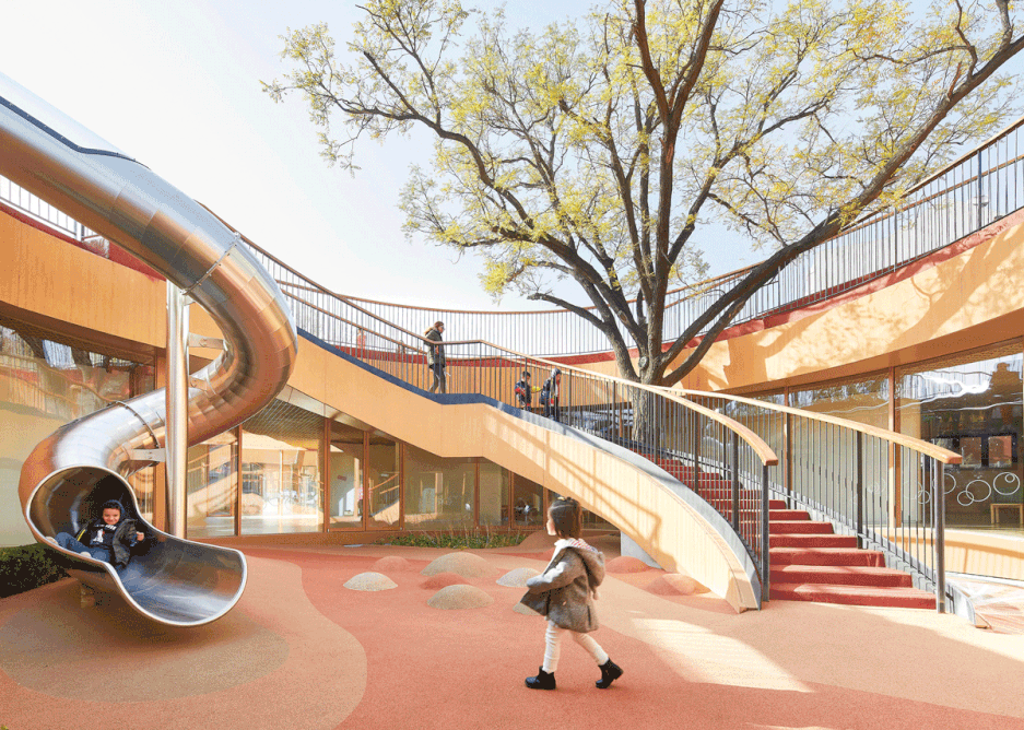 Slide, stair and stepping stones come together in one of the courtyards.