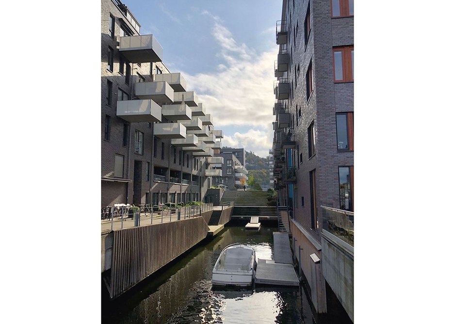 The former old container dock is now a new housing and leisure neighbourhood on the fjord with outdoor swimming pool and beach.