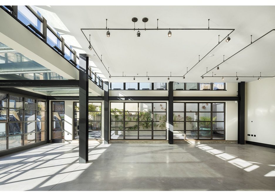 The top floor of the offices has its own roof terrace, looking over the roofs of its neighbours.