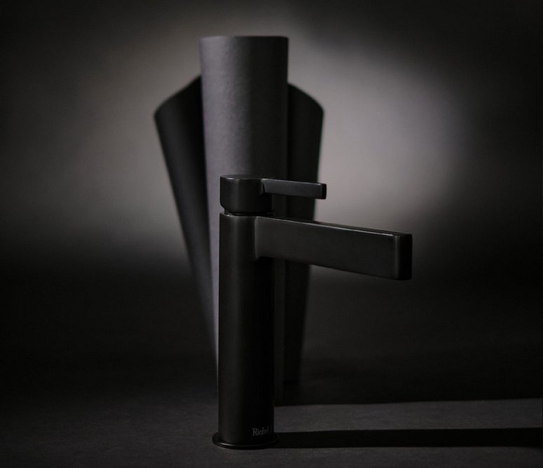 Paradox Short bathroom washbasin mixer tap in Black: Pleasing curves with an angular profile.