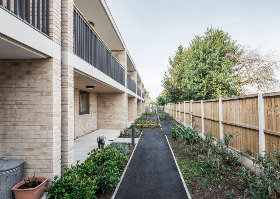 The scheme has access decks with scooter charging points at each front door, on ground floor and first floor levels.