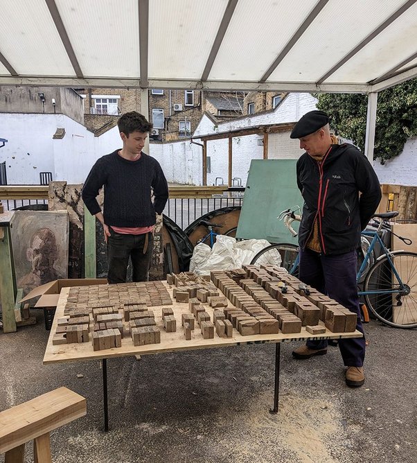 Reviewing brick specials with Thomas Phillips of Everything Now Design (left) and Knox Bhavan founding partner Simon Knox (right).